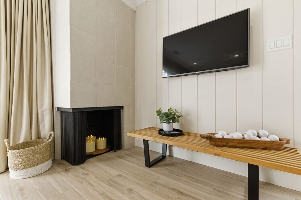 Relax by the after exploring Napa Valley wineries, with a smart TV and comfortable seating creating the perfect wine country evening retreat.
