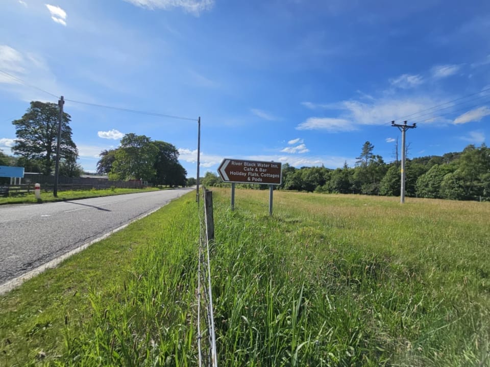 Road signs showing entrance to the property travelling from Inverness, entrance is on the left on the A835, 6 miles on from Garve