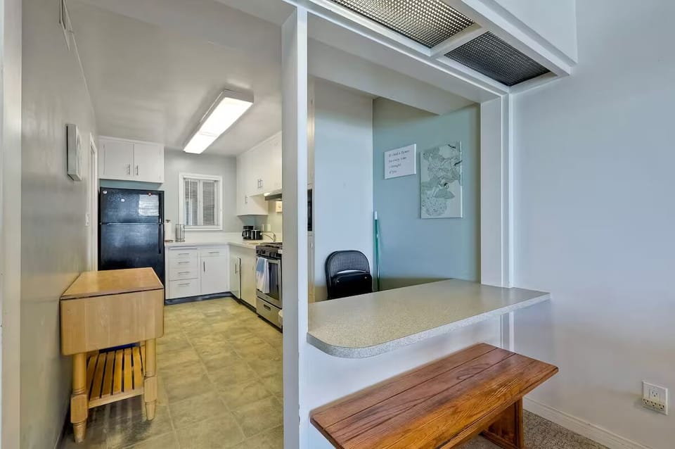 Sleek countertops and fully equipped kitchen — perfect for cooking up your favorite vacation meals.