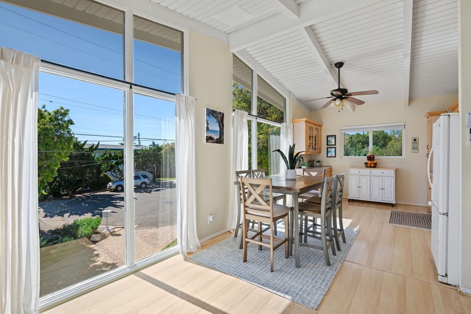 Open living area leads directly into the dining space and kitchen.