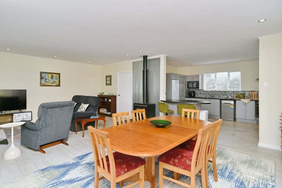 Dining table seats six — where the stories get told over dinner.