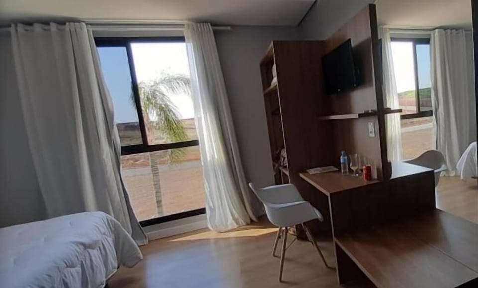 Deluxe Double Room, 1 Double Bed, City View | Minibar, laptop workspace, soundproofing, iron/ironing board