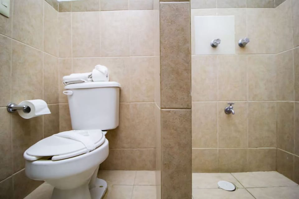 Refresh after adventures with a simple, clean walk-in shower.