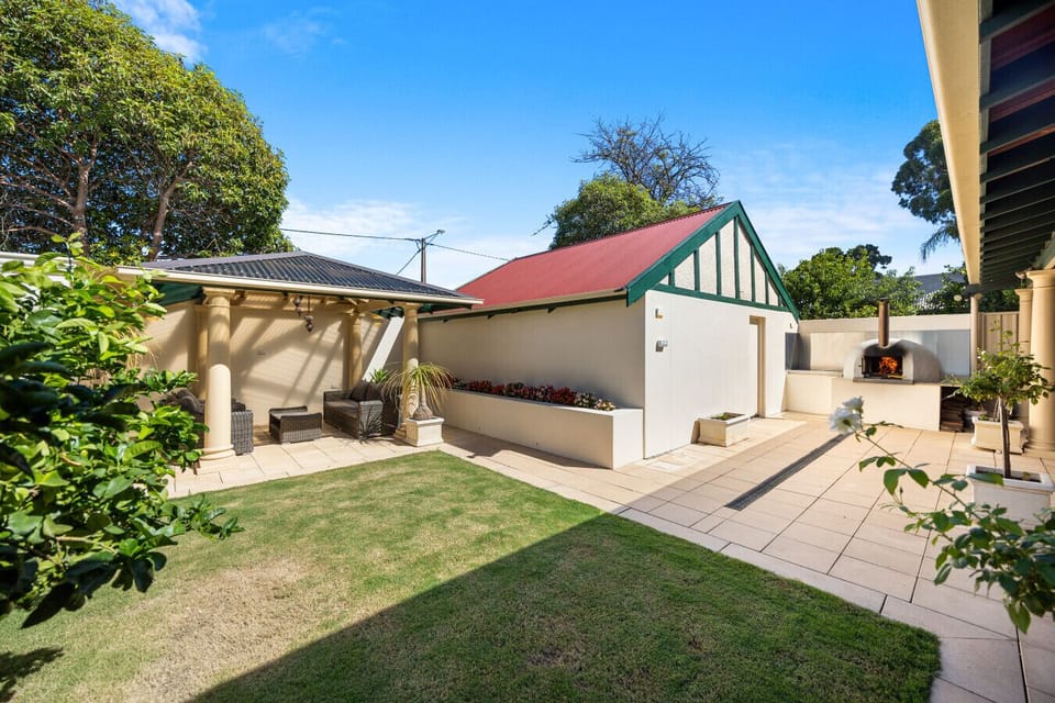 The private lawn and garden courtyard create a peaceful backdrop for slow afternoons outdoors.