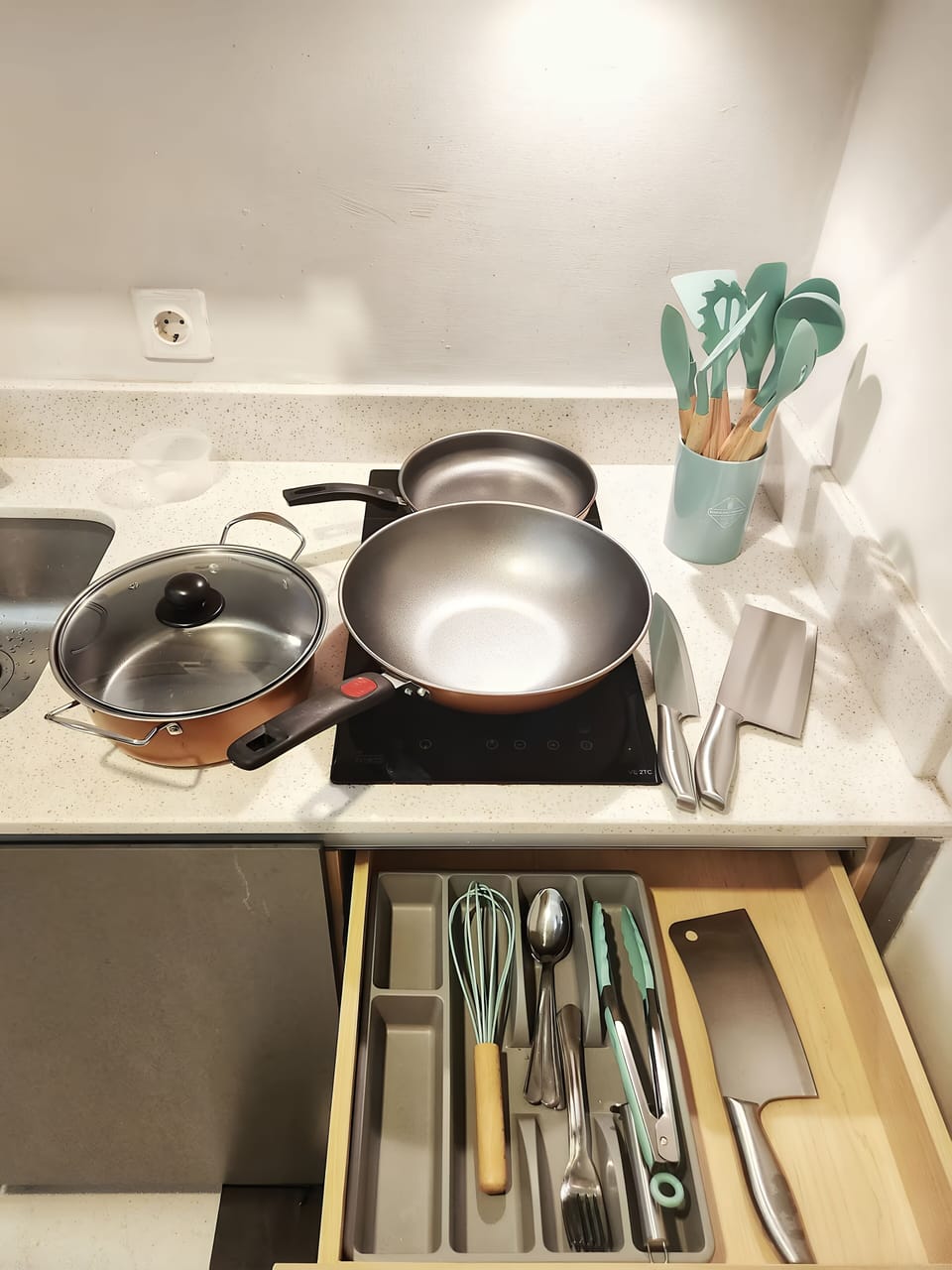 Mini-fridge, microwave, stovetop, cookware/dishes/utensils