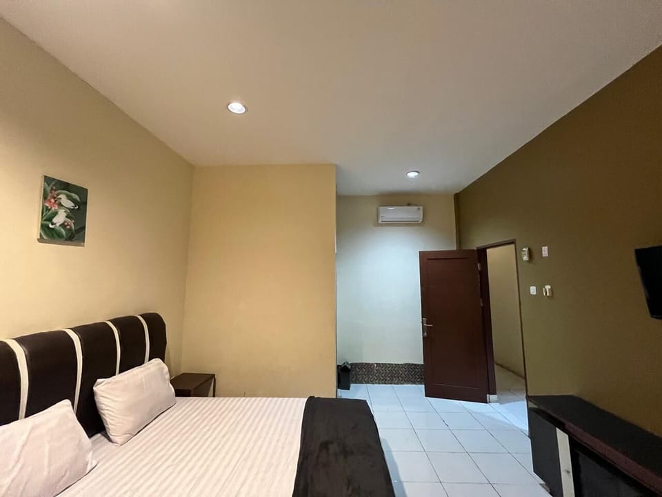 Deluxe Suite | WiFi (free), bed sheets