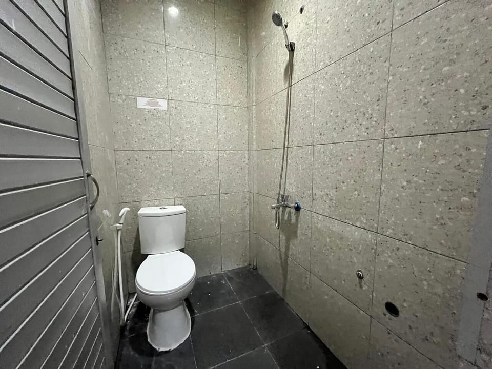 Shower, towels, soap, shampoo