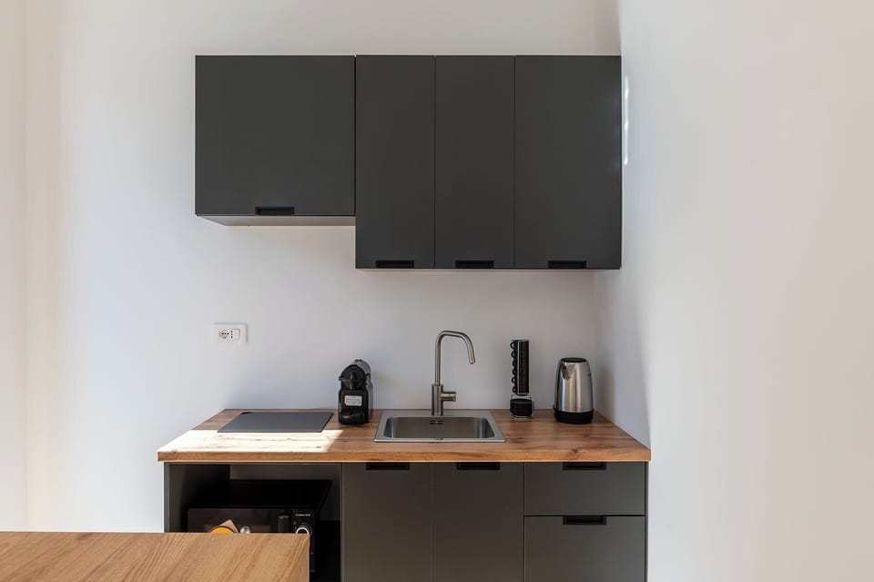 Apartment, 6 Bedrooms, Balcony | Private kitchen | Fridge, microwave, stovetop, espresso maker