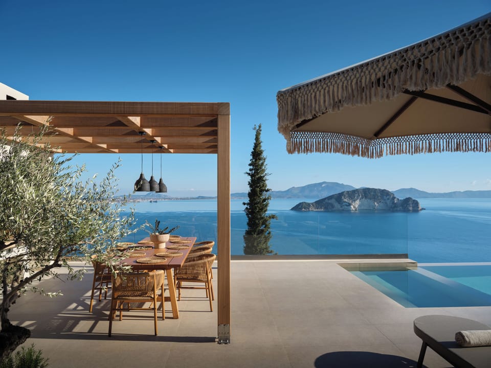 A picturesque dining setting with BBQ celebrating Mediterranean living and stunn