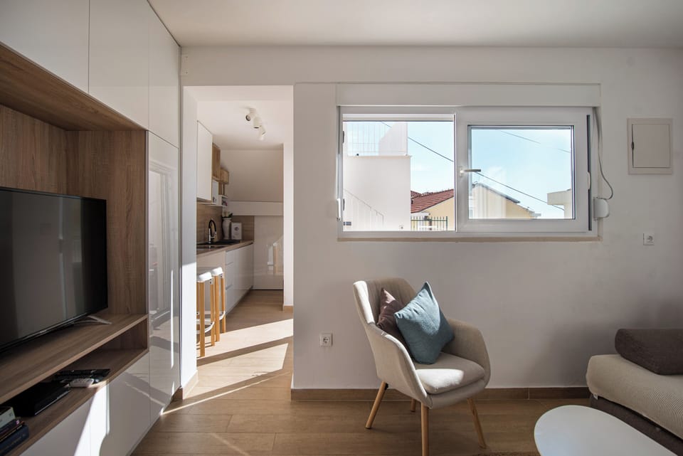 Apartment | Living area | 80-cm Smart TV with cable channels