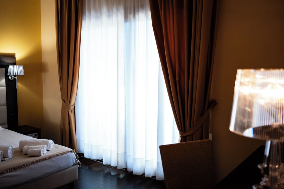 Triple Room, Garden View | In-room safe, desk, laptop workspace, blackout drapes