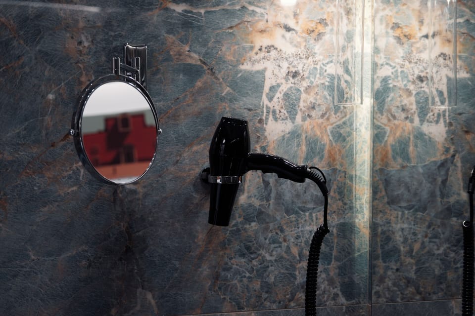 Superior Room | Bathroom amenities | Shower, hair dryer, towels, soap