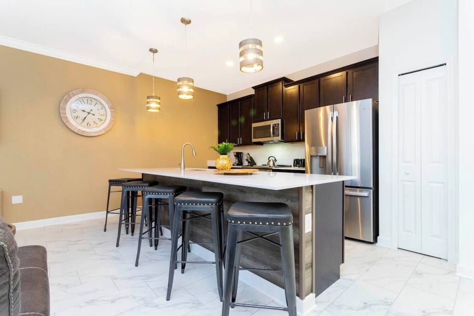 Fall in love for modern luxury with our stunning open kitchen—a beautiful, vibrant space that seamlessly combines style and functionality. a family-friendly retreat where the joy of cooking meets the warmth of togetherness.
