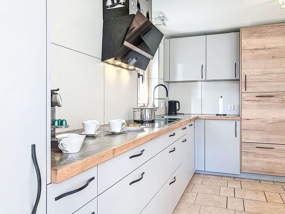 Countertop, Cabinetry, Kitchen, Kitchen Appliance, Flooring, Furniture, Wood, Interior Design, Drawer, Kitchen Sink