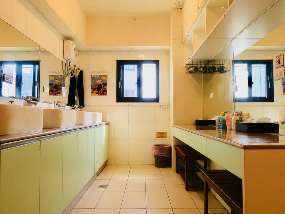 Shower, free toiletries, hair dryer, slippers