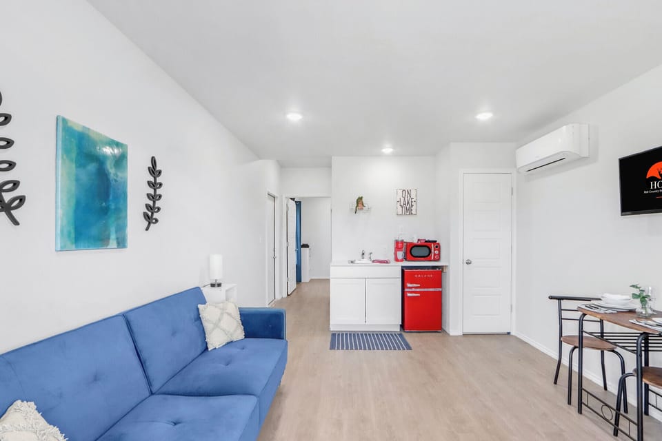 The kitchenette is conveniently located next to dining