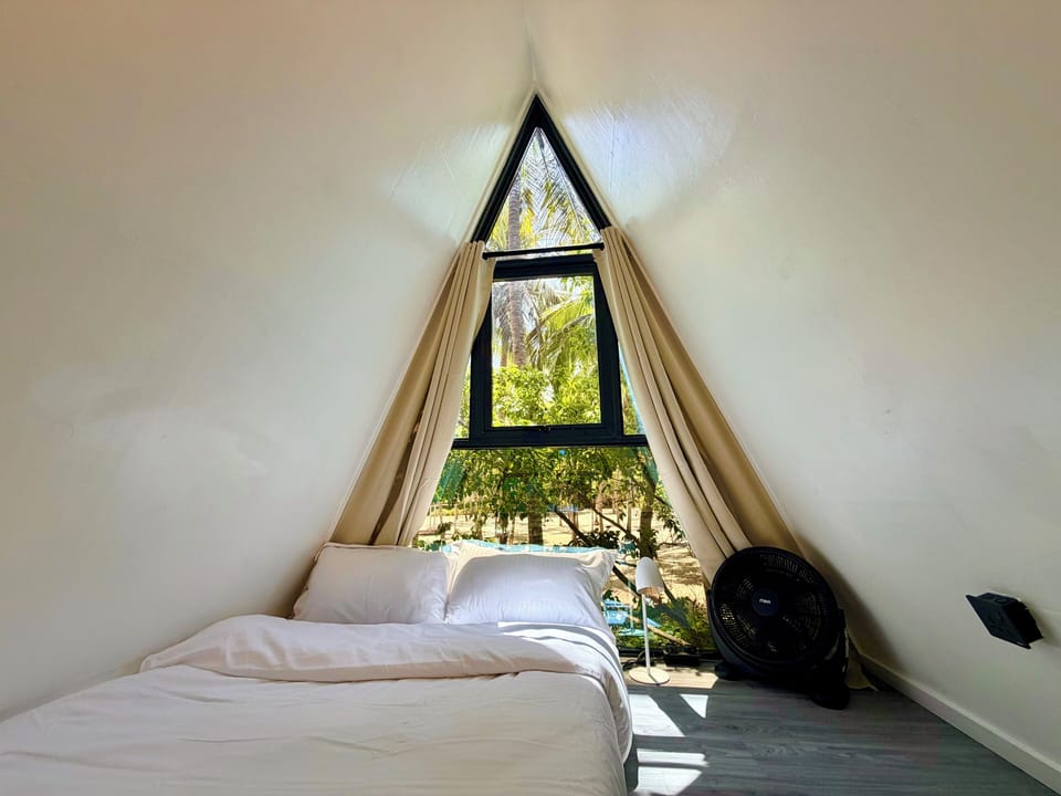Deluxe Triple Room, Partial Sea View | In-room safe, desk, free WiFi, bed sheets