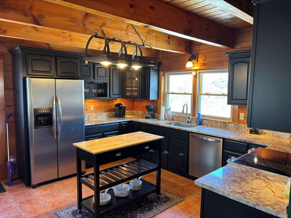 Fully stocked kitchen with plenty of space to prepare your home cooked meals