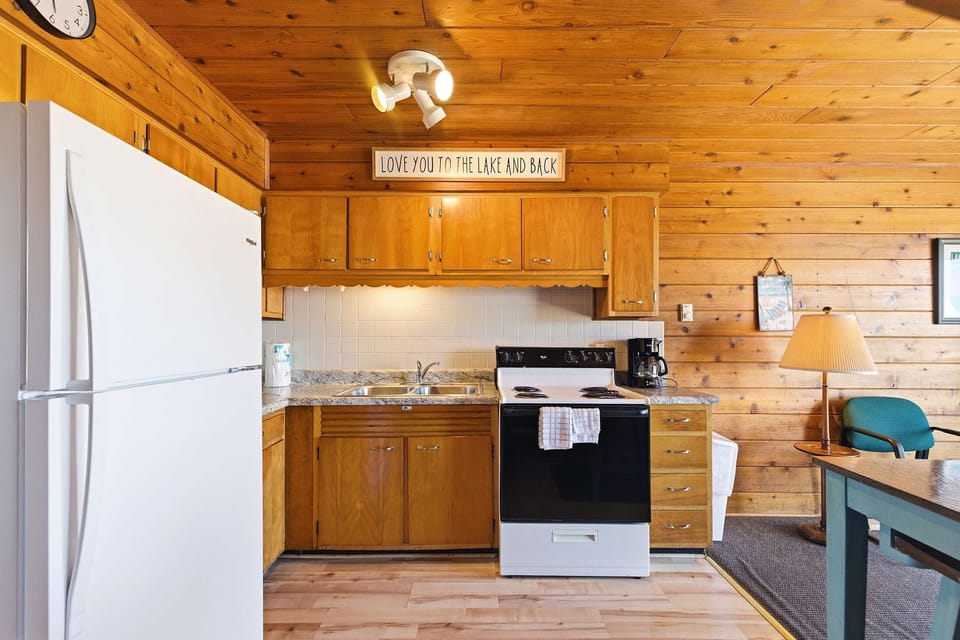 Full kitchen with major appliances for easy meals during your lakeside stay.