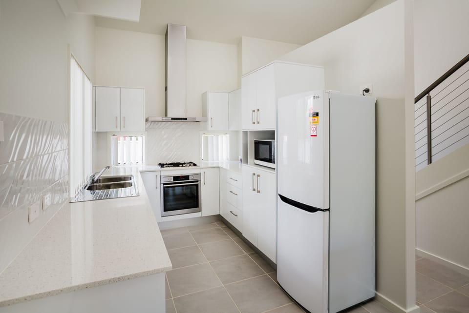 Executive Apartment, 2 Bedrooms | Private kitchen | Coffee/tea maker, full-size fridge, microwave, oven