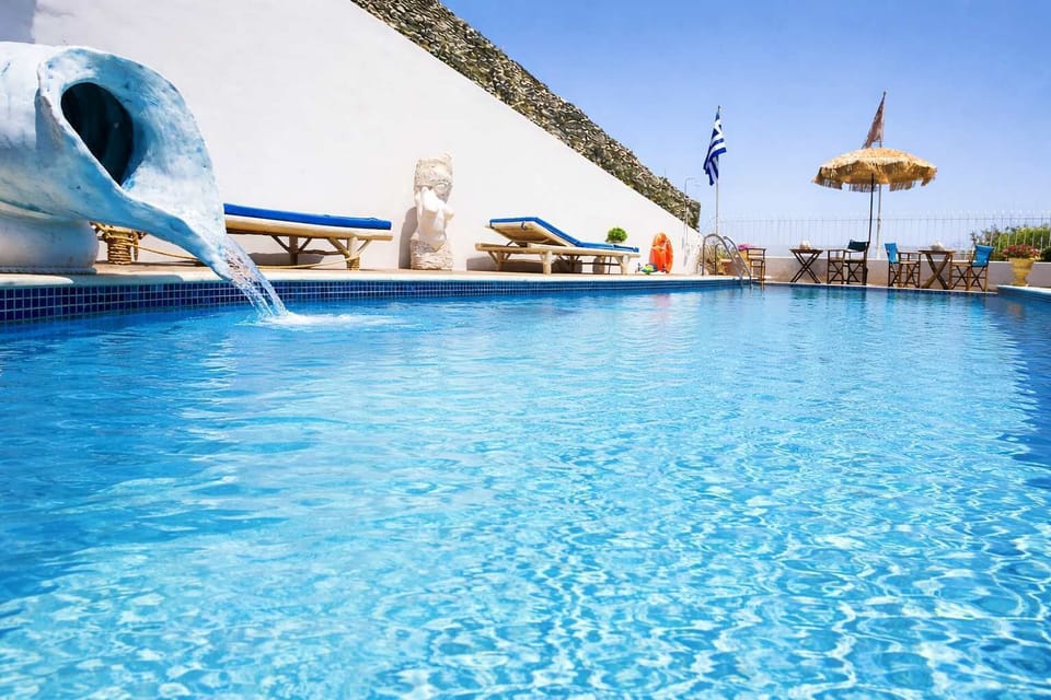 Crystal-clear swimming pool with sea views