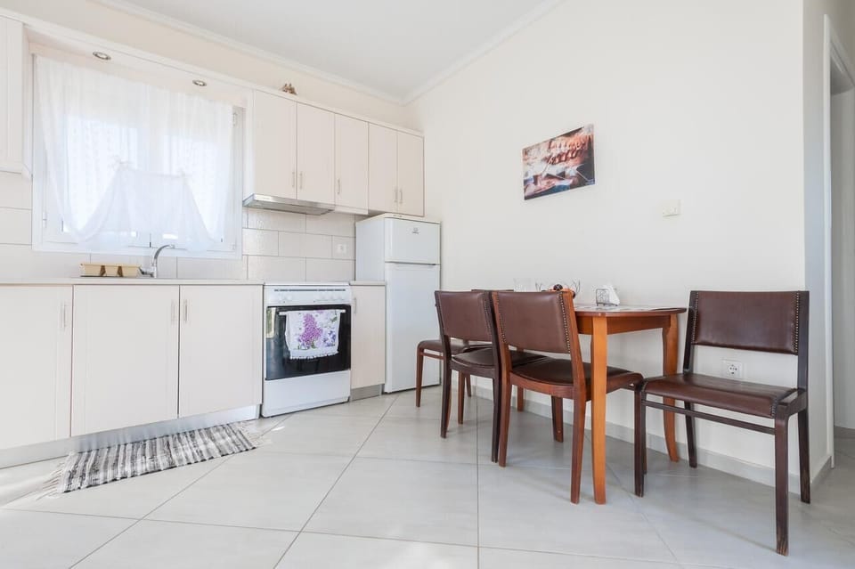 Bright kitchen and dining space perfect for family meals.