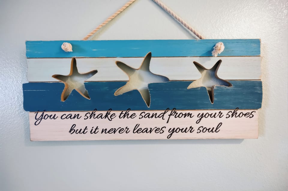 Charming coastal decor welcomes you with beach-inspired touches that instantly transport you to seaside serenity.