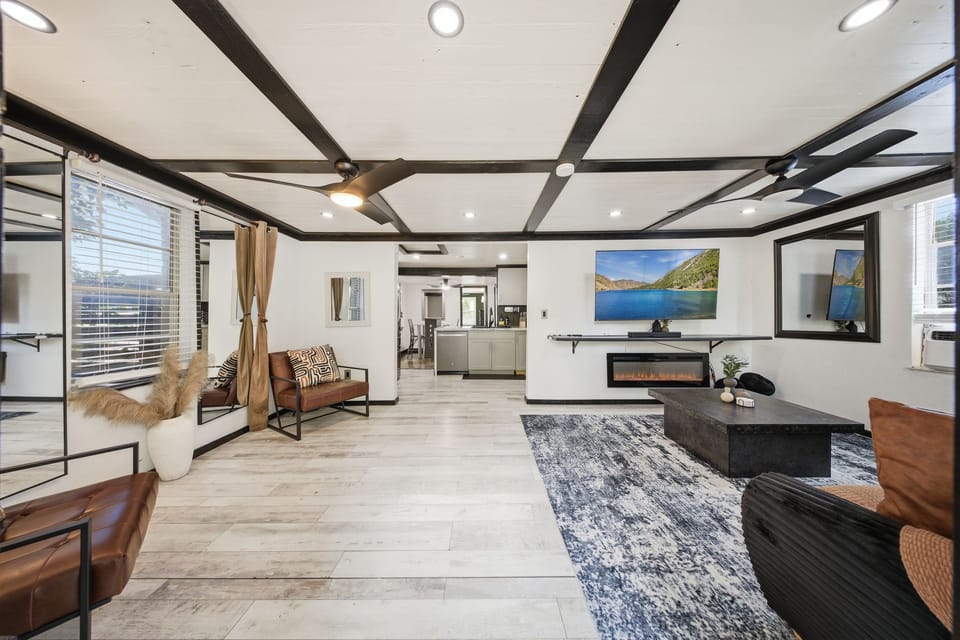 Bright open living room with modern fireplace and stylish design