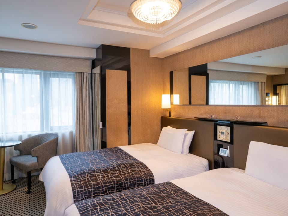 Twin Room, Non Smoking | Premium bedding, down comforters, desk, blackout drapes