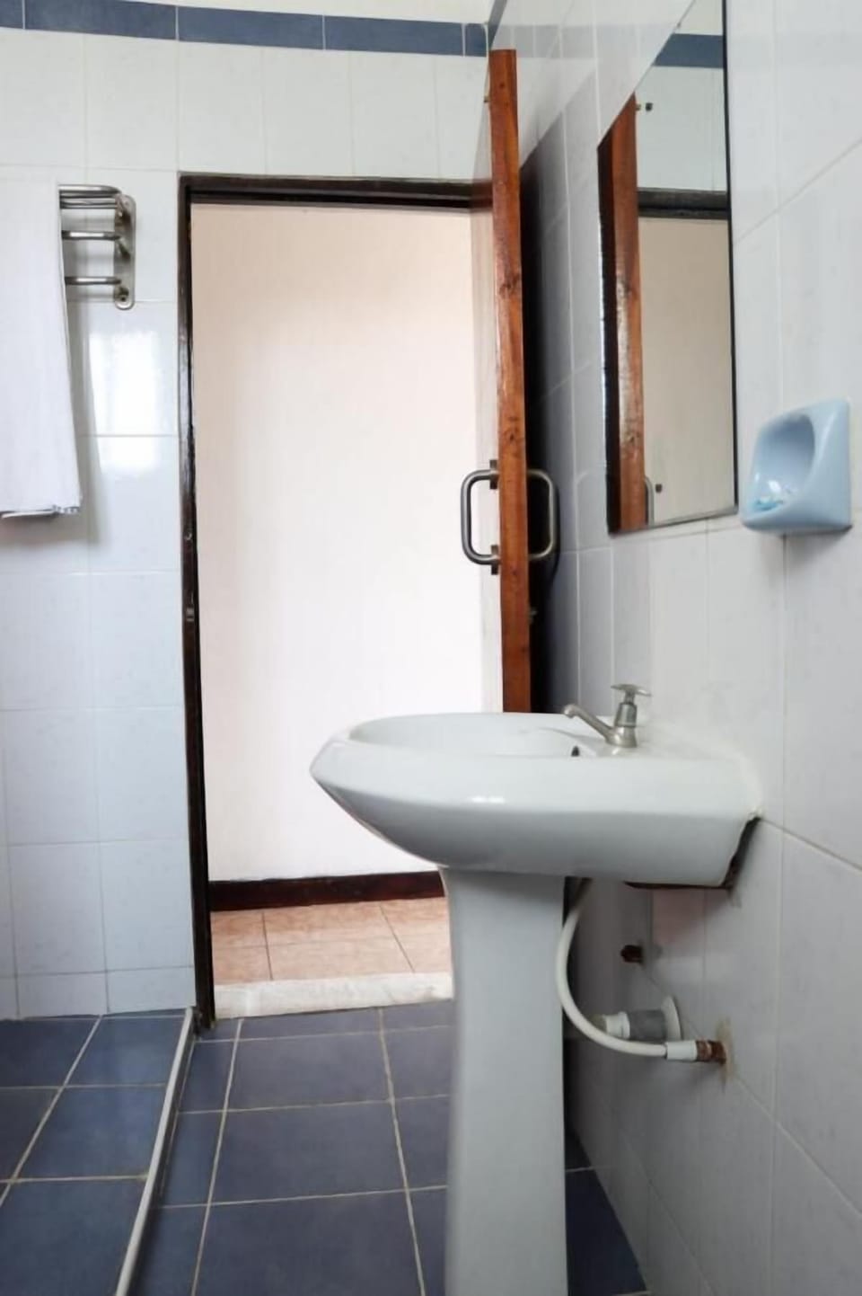 Standard Double Room | Bathroom | Shower, free toiletries, slippers, towels