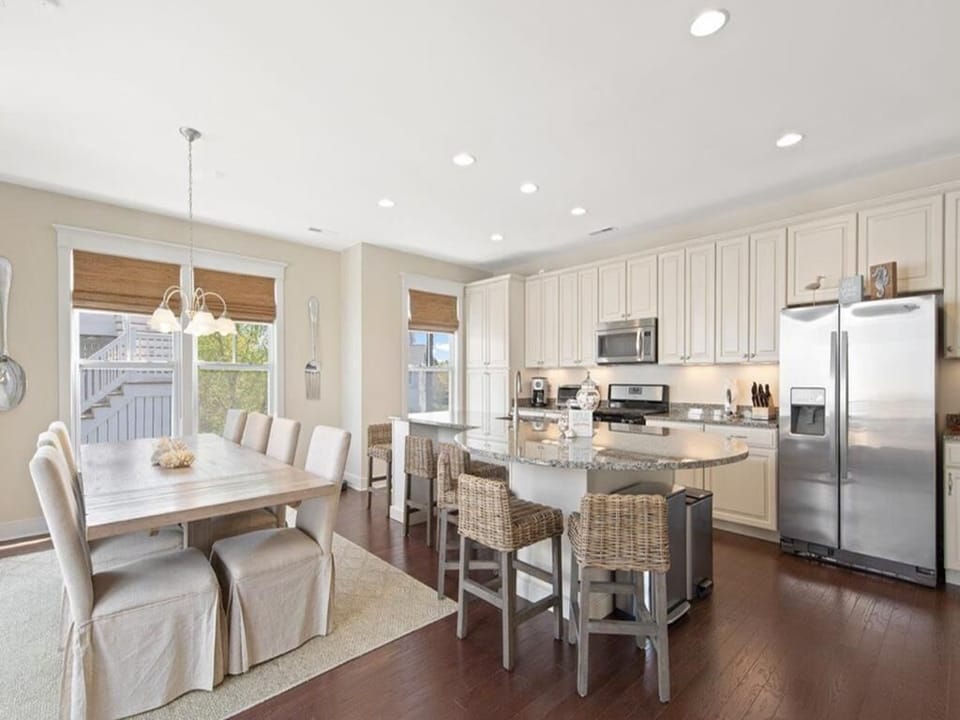 Gather around the modern kitchen island, where meals and memories await.