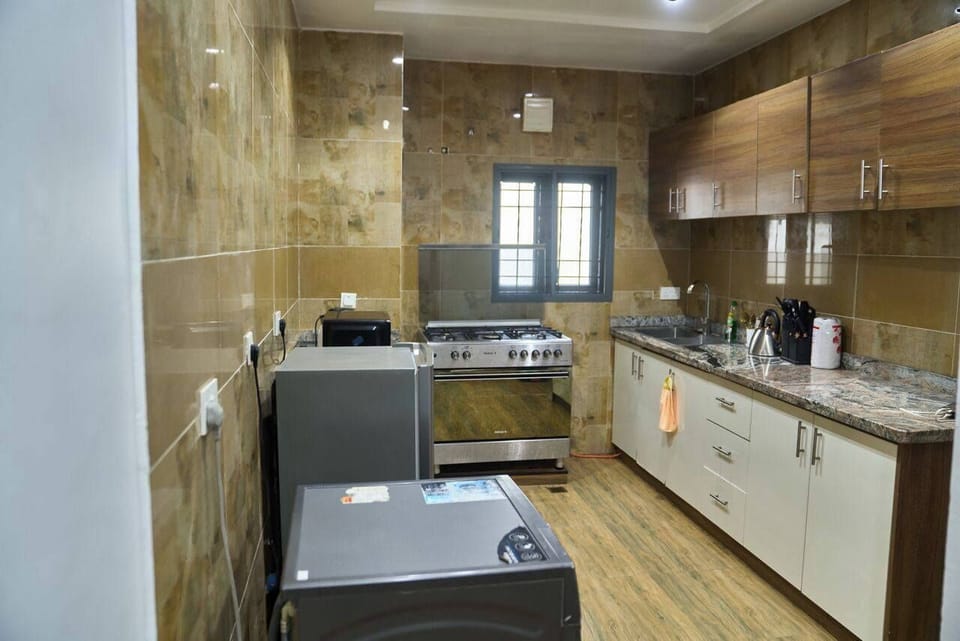 Economy Apartment, Balcony, City View | Private kitchen | Fridge, microwave, oven, stovetop