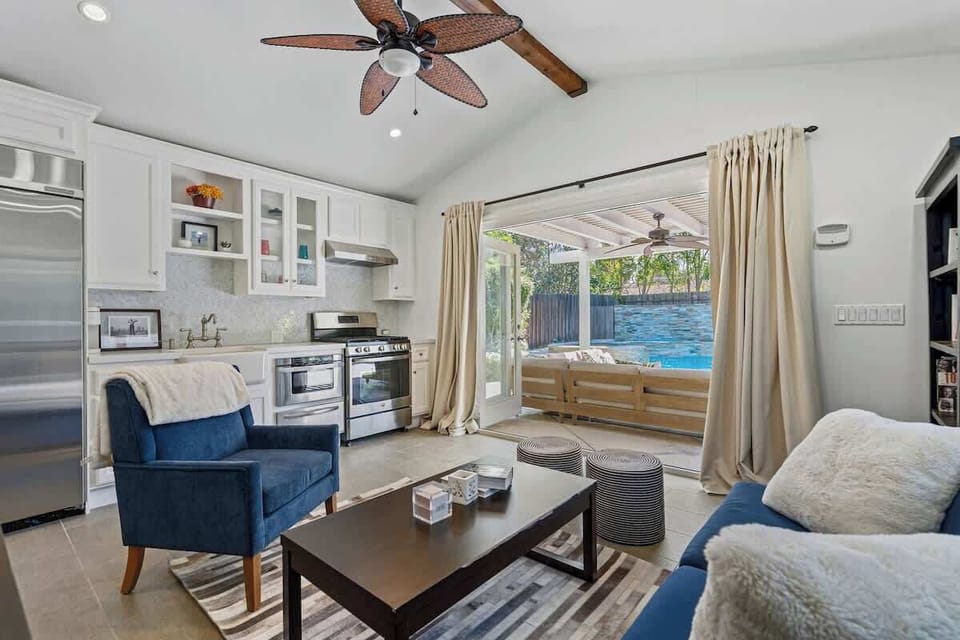 Open-Plan Living | Full Kitchen & Sliding Doors to Pool