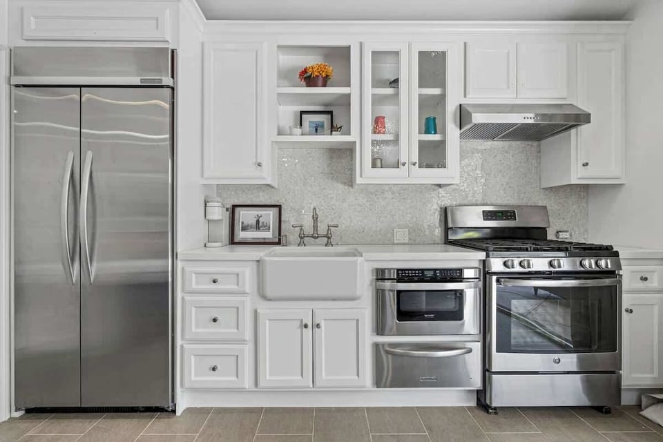 Kitchen | Gas Range, KitchenAid Fridge & Farmhouse Sink