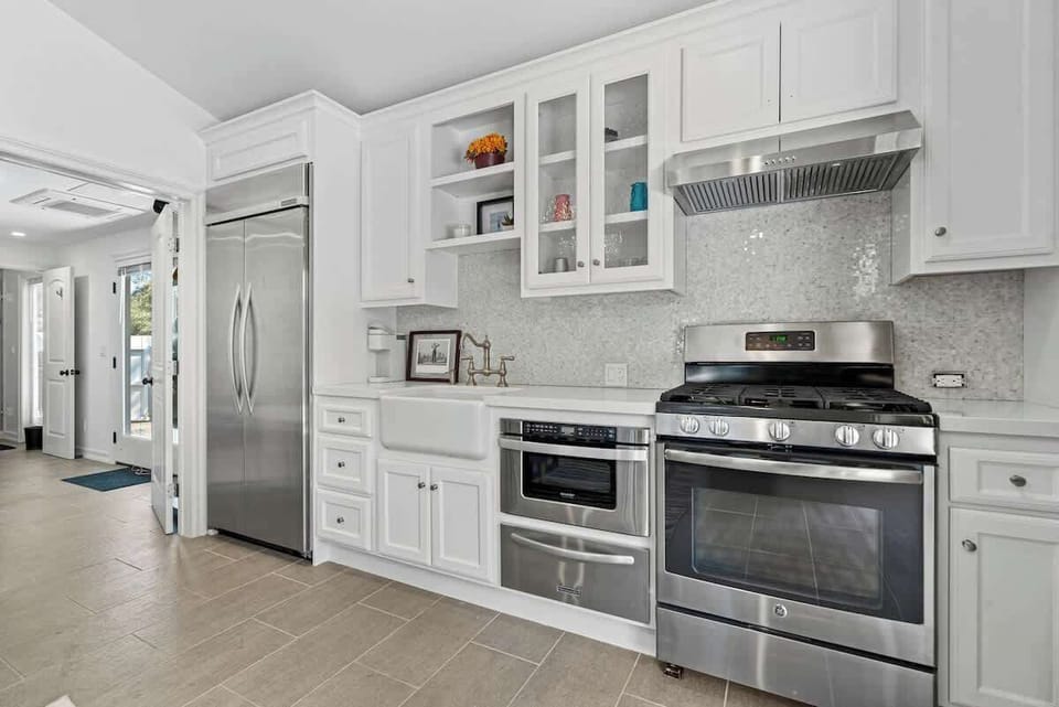 Kitchen | White Cabinets, Farmhouse Sink & Stainless Appliances