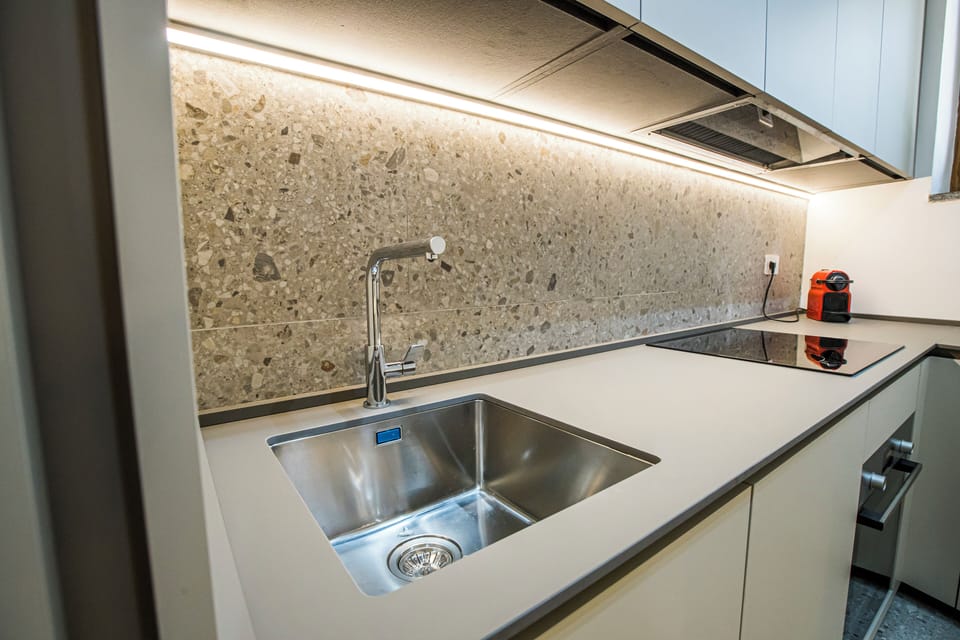 Apartment, Partial Lake View | Private kitchen | Fridge, stovetop, cookware/dishes/utensils