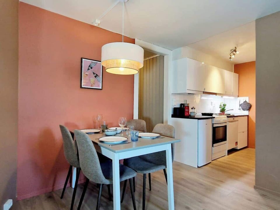 The dining table can comfortably fit four people