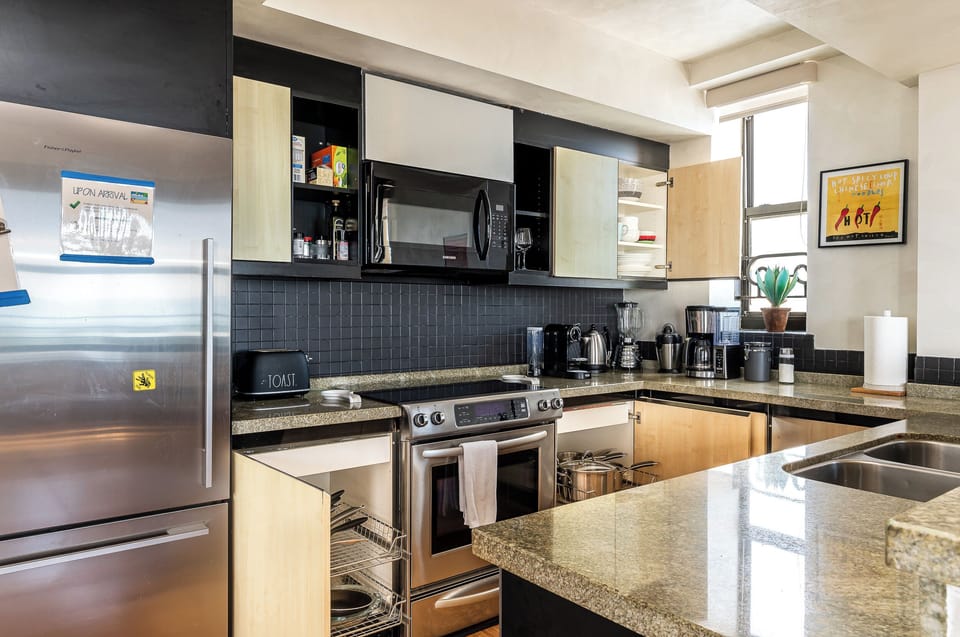 Panoramic Apartment, Beach View | Private kitchen | Electric kettle, toaster