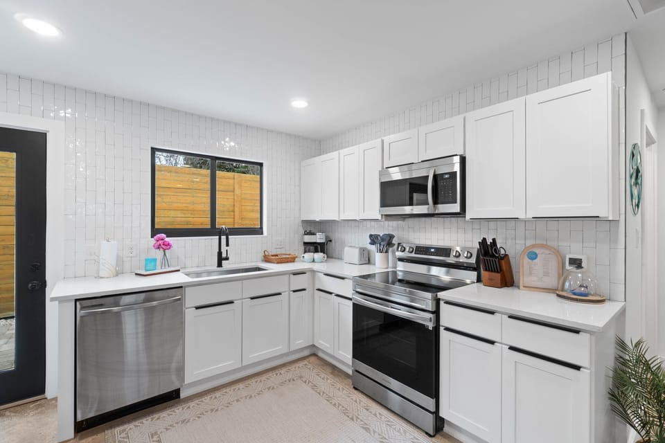 Cook delicious meals in your Fully-Stocked, Remodeled Kitchen with high end appliances