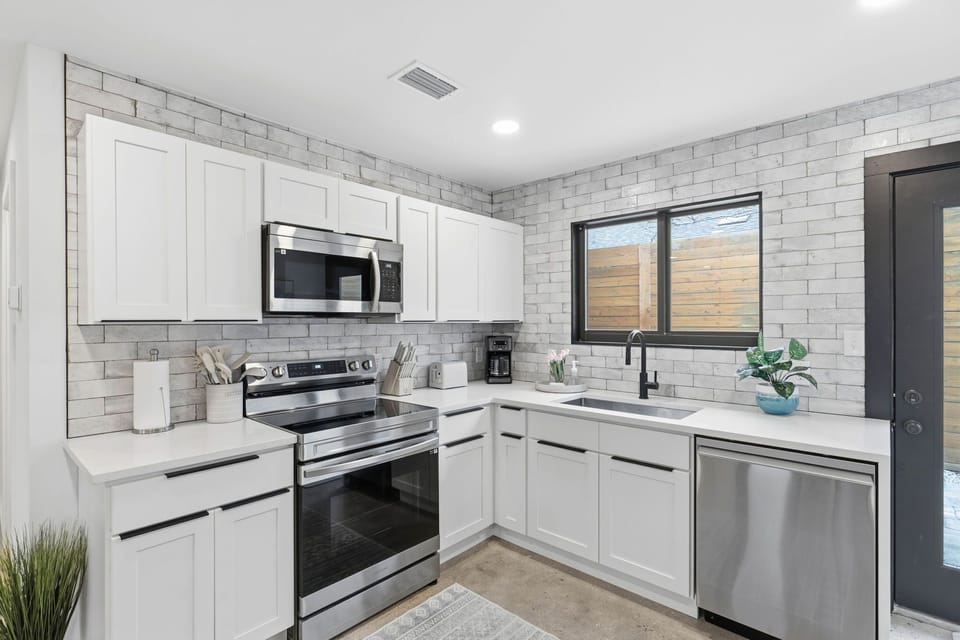 Cook delicious meals in your Fully-Stocked, Remodeled Kitchen with high end appliances