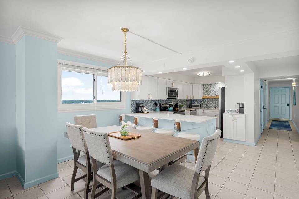 Stay at The Breakers View by Relax and Renew Rentals! This Panama City Beach condo features a fully stocked kitchen, spacious dining area, and bright coastal design. Perfect for family getaways, beach trips, and Gulf Coast vacations with stunning views.
