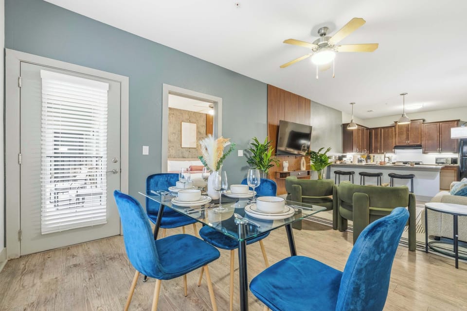 Bright dining area with seating for four and open-concept layout