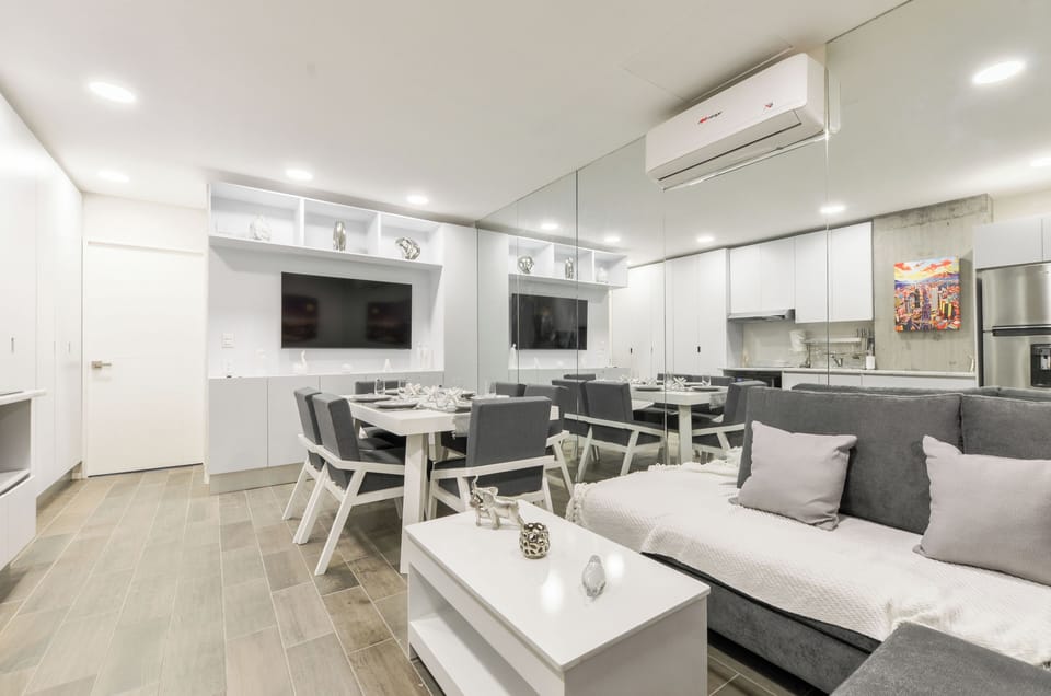 Basic Suite, City View | Living area | 55-inch Smart TV with digital channels, streaming services