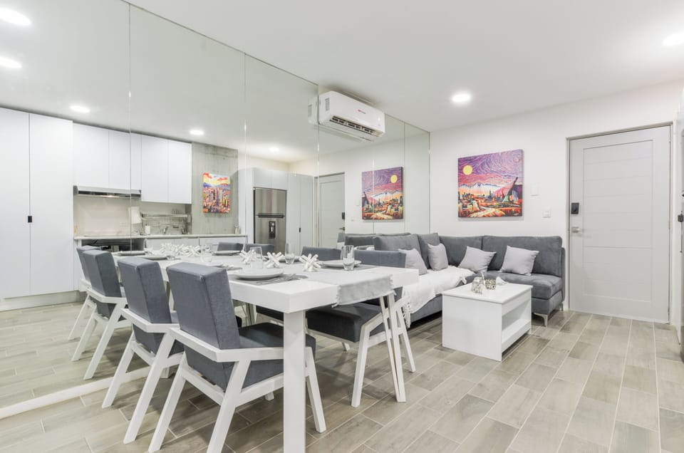 Basic Suite, City View | Living area | 55-inch Smart TV with digital channels, streaming services