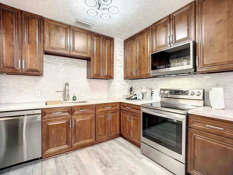 LG appliances, quartz counter tops, Keurig, coffee and tea. fully equipped kitchen.