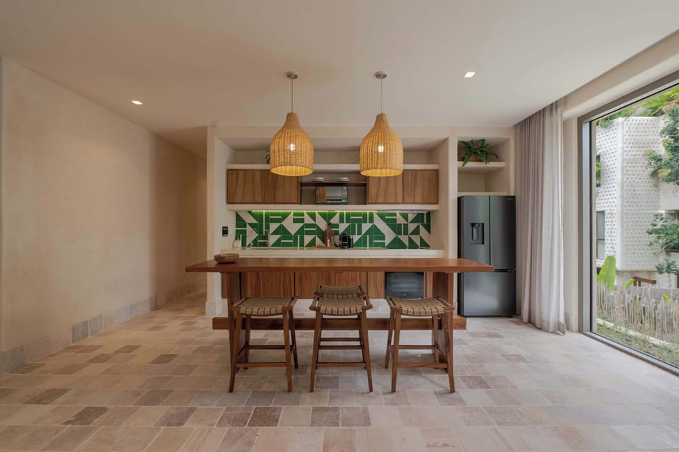 Open kitchen with a spacious island, perfect for morning coffee or casual dining.