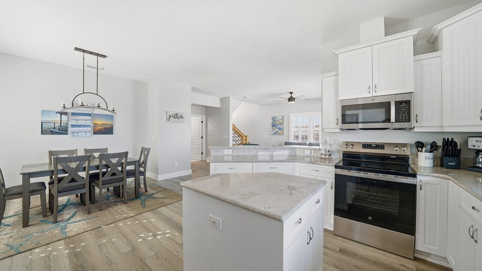 The layout makes it easy to cook while still enjoying the scenery and conversation.