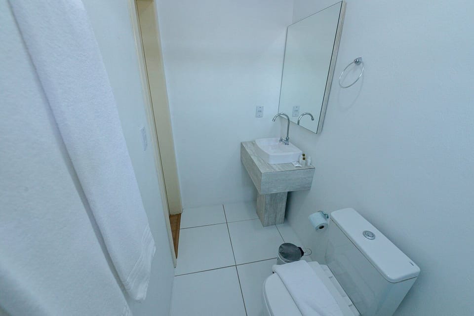 Standard Twin Room | Bathroom | Shower, towels, soap, toilet paper