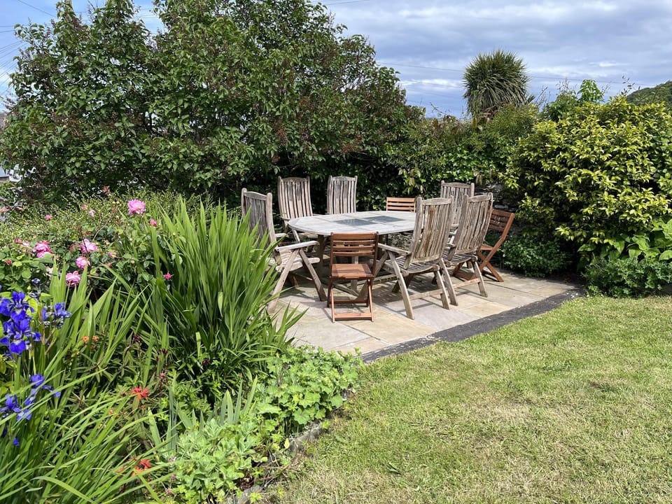 lovely enclosed cottage garden with patio area and BBQ