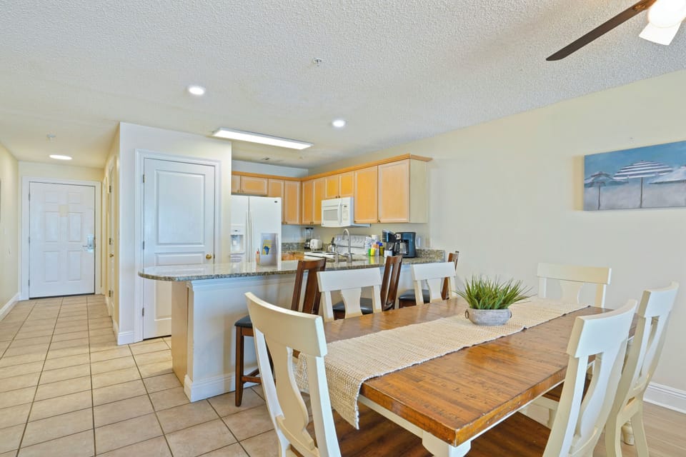At Emerald Dunes 202, mornings begin around this welcoming dining table, where fresh coffee and Gulf views set the tone for another beautiful day in Destin.